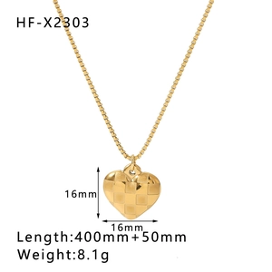 Close-up of golden heart pendant with checkerboard texture and technical specifications