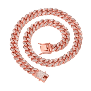 Detailed close-up of rose gold Cuban link chain with luxury clear zircon stone inlay