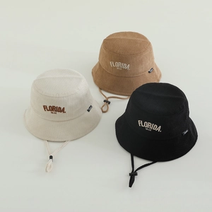 Kids corduroy bucket hats in beige, brown and black with Florida embroidery and straps