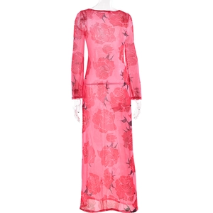 Detail of pink mesh long dress featuring vibrant red rose floral prints and sheer fabric