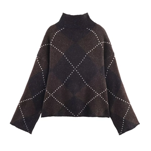 Vintage turtleneck sweater and skirt set with brown argyle knit pattern on white background