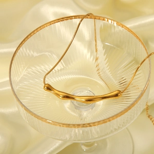 Minimalist 18K gold plated bar pendant necklace on a sleek snake chain over silk