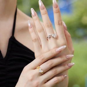 Detail of adjustable S925 sterling silver rings with F letter and heart cubic zirconia