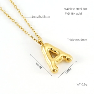 Macro view of 18K gold-plated stainless steel letter A balloon pendant with dimensions