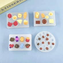 Macro view of silicone molds for crafting miniature waffles, donuts, and coffee cups