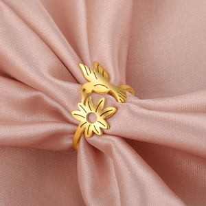 18K gold plated stainless steel ring featuring a hummingbird and flower design on pink silk