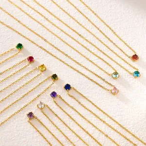 Macro view of 18K gold plated birthstone necklaces with multi-color zircon in claw settings
