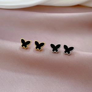 Minimalist titanium steel butterfly studs in gold and silver with black agate inlay