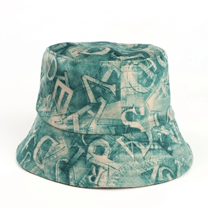 Detailed view of the teal suede bucket hat featuring vintage letter print and fabric texture