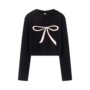 Short black knit sweater for women featuring a large pink bow graphic and round neck