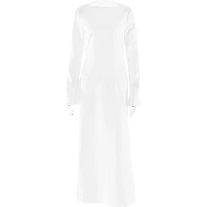 Detail view of white satin long sleeve dress with elegant silhouette and smooth finish