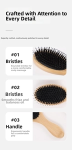 Macro detail of natural bamboo boar bristle hairbrush with ergonomic handle and soft pins