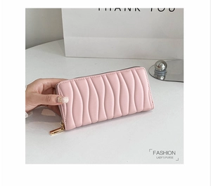 Pink long PU leather wallet featuring wave stitching detail and golden zipper closure