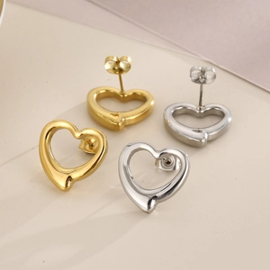 Fashionable hollow heart-shaped earrings in gold and silver stainless steel set