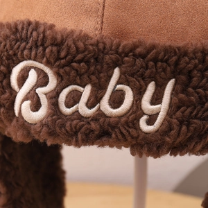 Furry brown winter aviator hat for babies featuring a cute Baby embroidery and plush lining