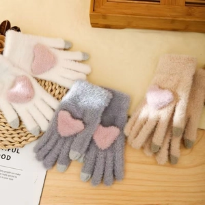 Plush faux mink winter gloves for men and women featuring touchscreen tips and heart detail