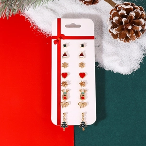 Christmas stud earring set featuring reindeer, trees and bells in red green and gold finish