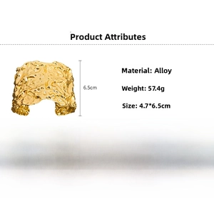 Detailed view of wide gold alloy cuff bracelet with hammered metal texture and size specs