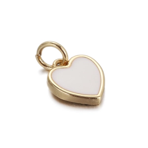 Detailed view of heart-shaped 18K gold plated pendant with white enamel center