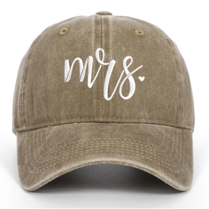 Close-up of white Mrs. embroidery and heart on vintage washed cotton baseball cap