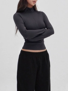 Slim fit dark grey long sleeve sports top with V-neck zipper and stand collar for women