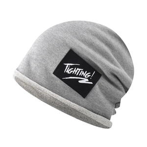 Grey cotton knit beanie hat with Fighting text patch for men and women outdoor wear