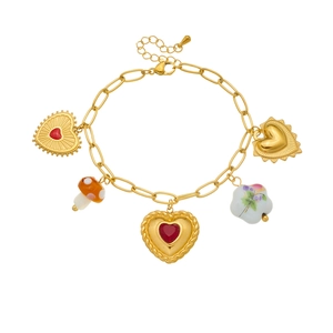 Gold stainless steel bracelet with mushroom, sacred heart and floral ceramic charms