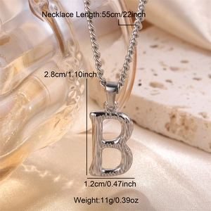 Detailed view of hammered silver letter B pendant showing precise dimensions and size specs