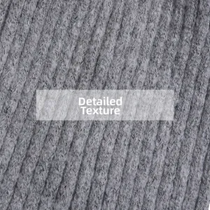 Vista macro della trama in maglia a coste grigio scuro per cappelli invernali