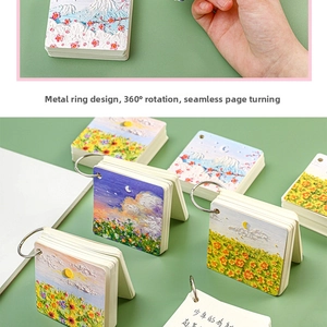 Detail view of oil painting pocket notebook with iron ring and 360 degree rotation