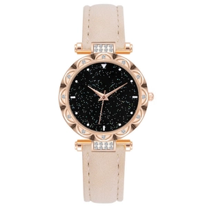 Women's rose gold tonneau watch with black starry dial and white leather strap