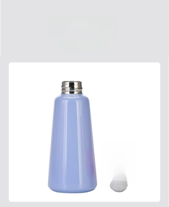 Close-up of light purple stainless steel thermal cup with a blue spherical lid