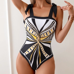 One-piece swimsuit with geometric black gold print and adjustable bow shoulder straps