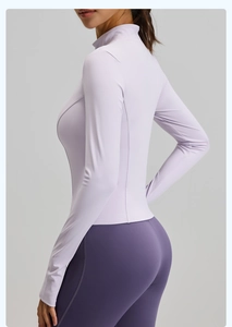 Slim fit women's sports jacket featuring ergonomic seams and a stand-up collar design