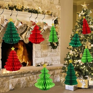 Festive honeycomb paper Christmas tree table ornaments in red and green with gold stars