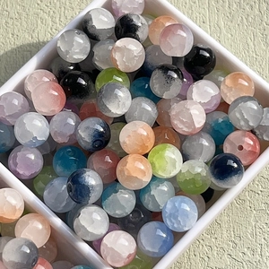 Macro shot of 10mm ice-cracked glass beads in assorted colors for jewelry making