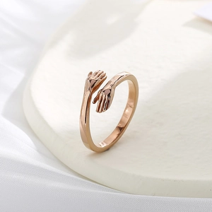 Minimalist rose gold stainless steel hugging hands open ring with high-polished finish