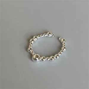 Detailed view of 925 silver beaded open ring with polished spheres and adjustable band