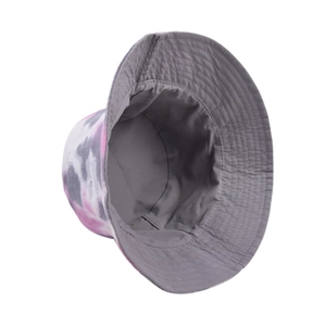 Detailed side view of tie-dye bucket hat in pink, grey and white with cotton texture