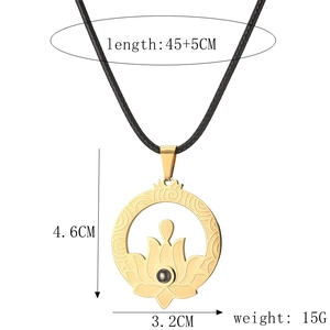 Detailed view of golden lotus pendant on black cord with size and weight annotations