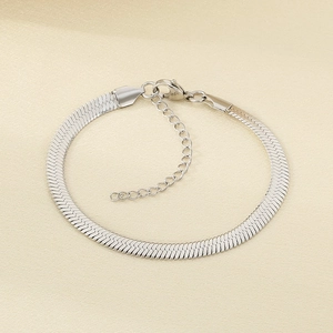 Close-up of silver herringbone bracelet with lobster clasp and adjustable link chain