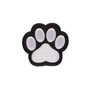 Embroidered black and white dog paw print patch for clothing and accessories