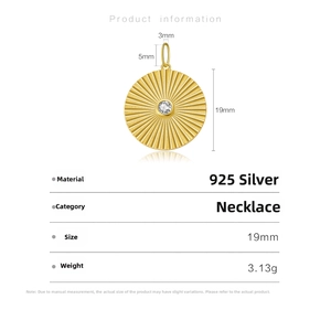Detailed view of a 19mm gold plated S925 silver sunburst pendant with center stone