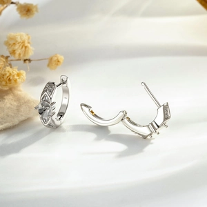 Minimalist silver lattice hoop earrings with micro-paved cubic zirconia and empty stone setting