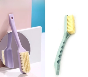 Detail of ergonomic long-handle soft bristle cleaning brush with hanging hole