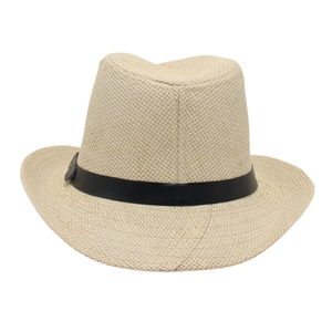 Macro detail of breathable beige straw fedora weave with a sleek black leather band