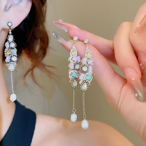 Long tassel drop earrings featuring champagne gold frame and multi-colored gemstones