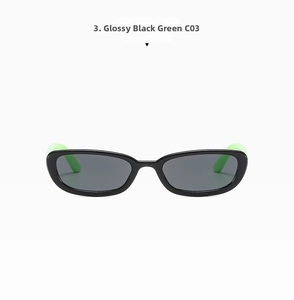 Detail view of oval sunglasses with shiny black frame and neon green legs, model C03