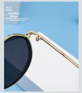 Close-up of durable golden metal hinges and smooth mechanism on trendy sunglasses