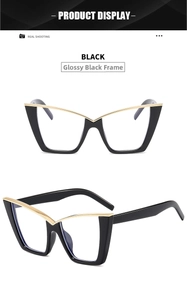 Detailed front and side view of bright black cat-eye glasses with gold metal accents